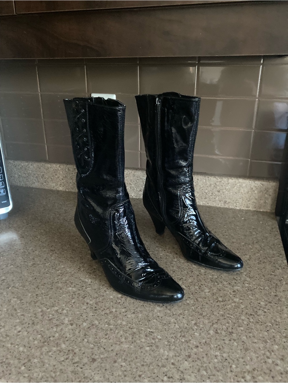 Salvatore Ferragamo Black Patent Leather Ankle Boots with Decorative Stitching